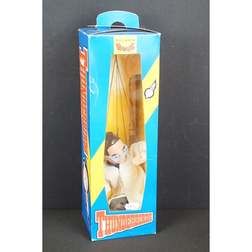 396 - Four boxed Pelham Puppets Thunderbirds puppets to include Lady Penelope, Brains, Parker (box shows t... 