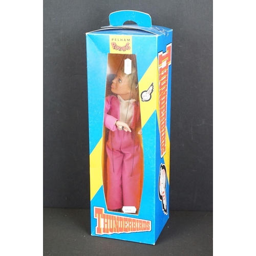 396 - Four boxed Pelham Puppets Thunderbirds puppets to include Lady Penelope, Brains, Parker (box shows t... 