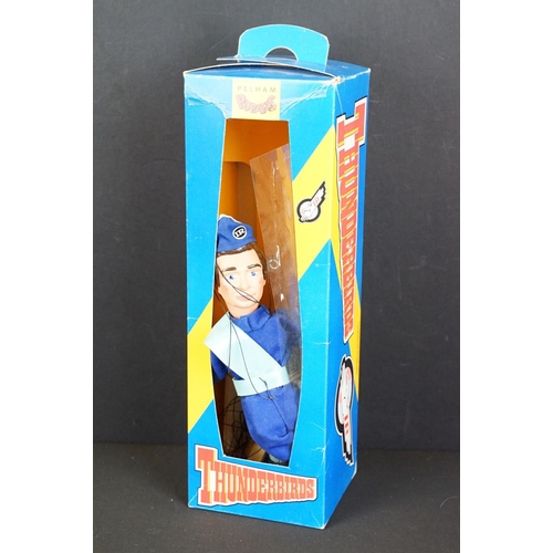 396 - Four boxed Pelham Puppets Thunderbirds puppets to include Lady Penelope, Brains, Parker (box shows t... 