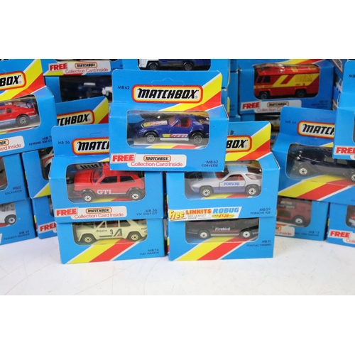 1346 - 82 Boxed Matchbox diecast models in blue boxes with 'red/yellow stripe', all appearing unopened