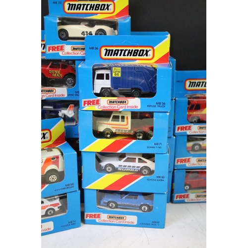 1346 - 82 Boxed Matchbox diecast models in blue boxes with 'red/yellow stripe', all appearing unopened