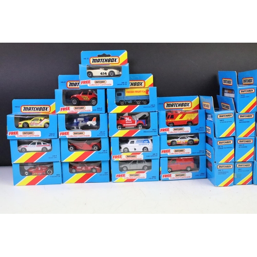 1346 - 82 Boxed Matchbox diecast models in blue boxes with 'red/yellow stripe', all appearing unopened