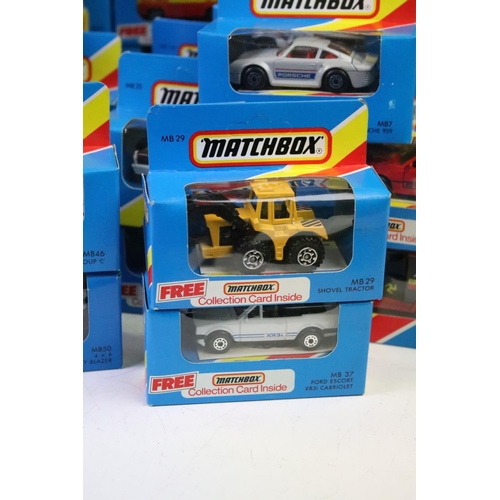 1346 - 82 Boxed Matchbox diecast models in blue boxes with 'red/yellow stripe', all appearing unopened