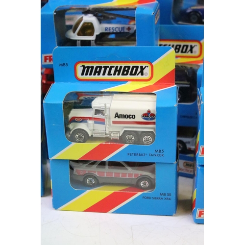 1346 - 82 Boxed Matchbox diecast models in blue boxes with 'red/yellow stripe', all appearing unopened