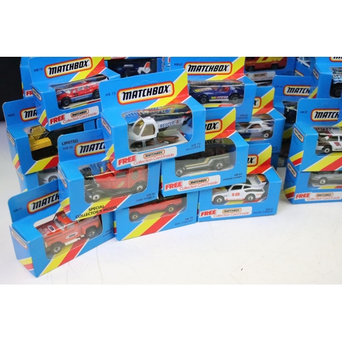 1346 - 82 Boxed Matchbox diecast models in blue boxes with 'red/yellow stripe', all appearing unopened