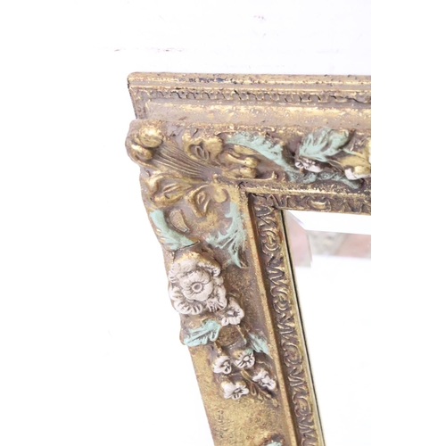 550 - Gilt Framed Bevelled Edge Rectangular Mirror with coloured floral and foliate moulded frame, 49cm x ... 