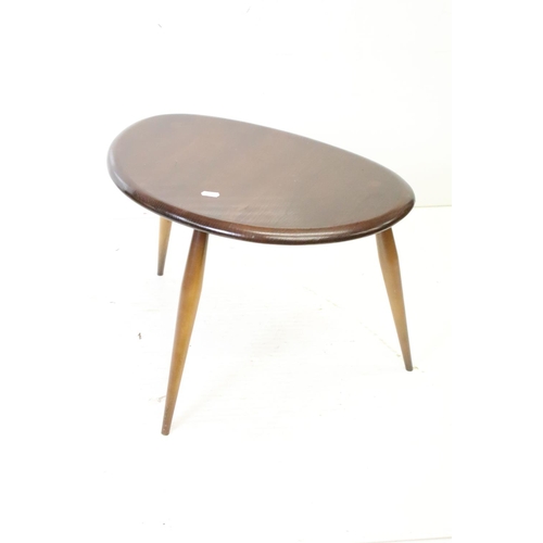 554 - Ercol Nest of Three Dark Elm and Beech Pebble Tables, model no. 354, largest table 41cm high x 65cm ... 