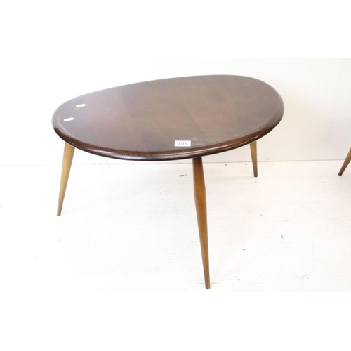 554 - Ercol Nest of Three Dark Elm and Beech Pebble Tables, model no. 354, largest table 41cm high x 65cm ... 