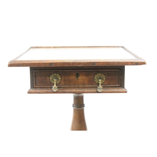 587 - 18th century and later Lamp Table, the square oak top with drawer, raised on a pedestal support with... 