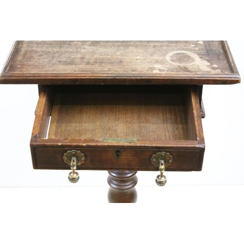 587 - 18th century and later Lamp Table, the square oak top with drawer, raised on a pedestal support with... 