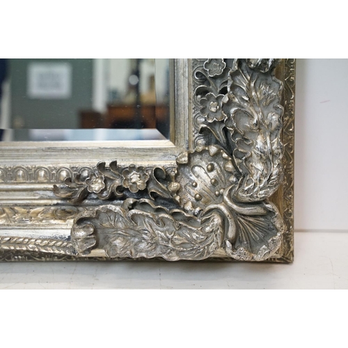 541 - Large Contemporary Mirror with silvered foliage moulded frame and bevelled edge, 176cm x 90cm