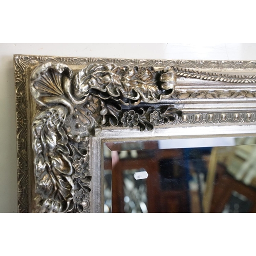 541 - Large Contemporary Mirror with silvered foliage moulded frame and bevelled edge, 176cm x 90cm