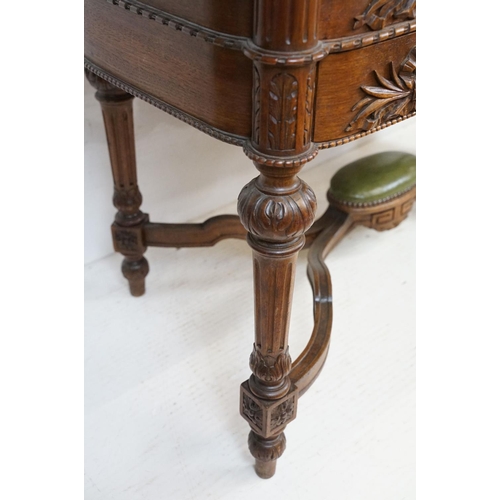 555 - 19th century Mahogany Desk of kidney outline, green leather inset top with fluted carved edge, the f... 