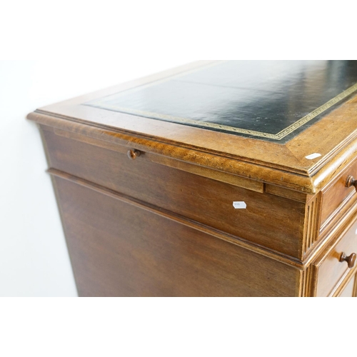 560 - 19th century style Mahogany Twin Pedestal Desk with black leather inset top and an arrangement of ni... 