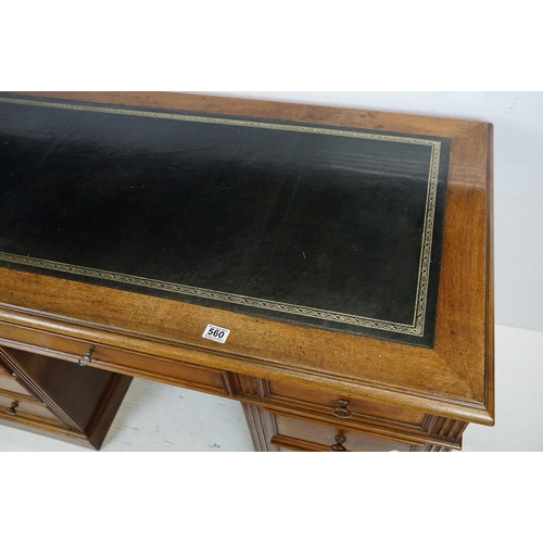 560 - 19th century style Mahogany Twin Pedestal Desk with black leather inset top and an arrangement of ni... 