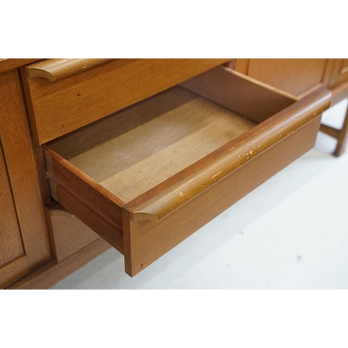 564 - Mid century Retro ' Stonehill Furniture Ltd ' Teak Sideboard comprising three drawers with rolled ha... 