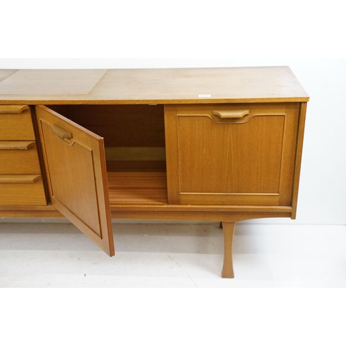 564 - Mid century Retro ' Stonehill Furniture Ltd ' Teak Sideboard comprising three drawers with rolled ha... 