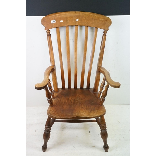 568 - 19th century Elm Seated Lathe Back Windsor Elbow Chair, 65cm wide x 107cm high