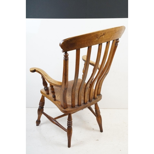 568 - 19th century Elm Seated Lathe Back Windsor Elbow Chair, 65cm wide x 107cm high