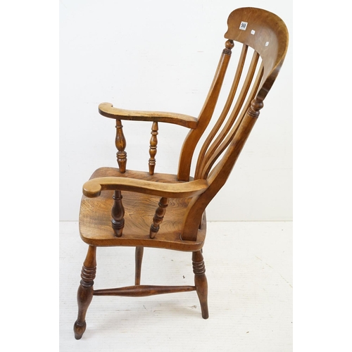 568 - 19th century Elm Seated Lathe Back Windsor Elbow Chair, 65cm wide x 107cm high