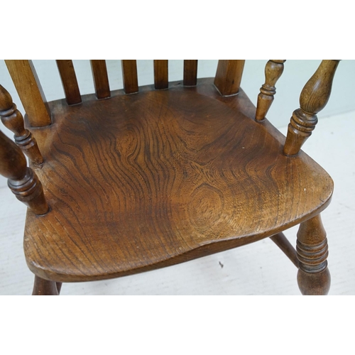 568 - 19th century Elm Seated Lathe Back Windsor Elbow Chair, 65cm wide x 107cm high