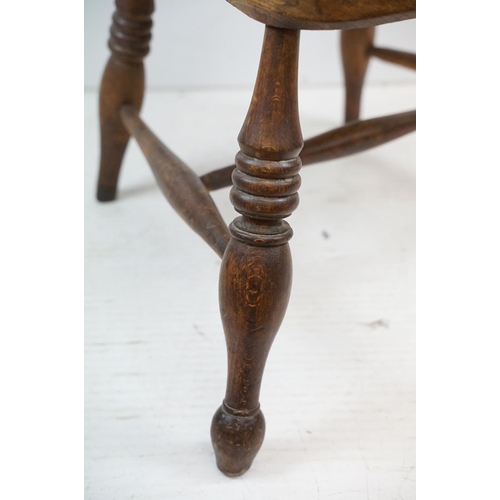 568 - 19th century Elm Seated Lathe Back Windsor Elbow Chair, 65cm wide x 107cm high