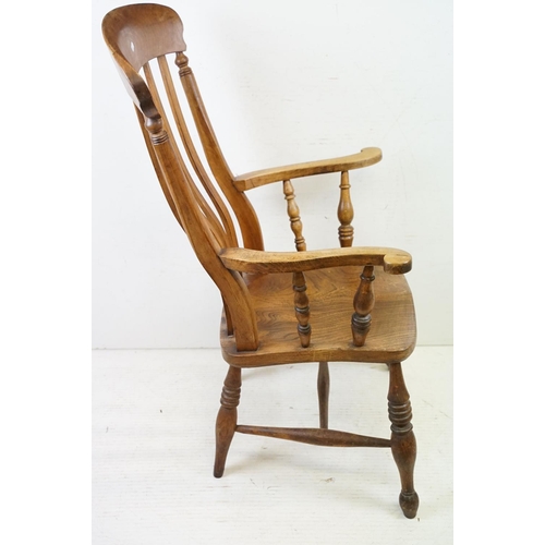 568 - 19th century Elm Seated Lathe Back Windsor Elbow Chair, 65cm wide x 107cm high