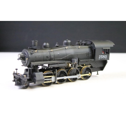 109 - Four Ho gauge locomotives to include a boxed Rivarossi 1224 Indiana Harbour Belt 102, boxed Piko BR5... 