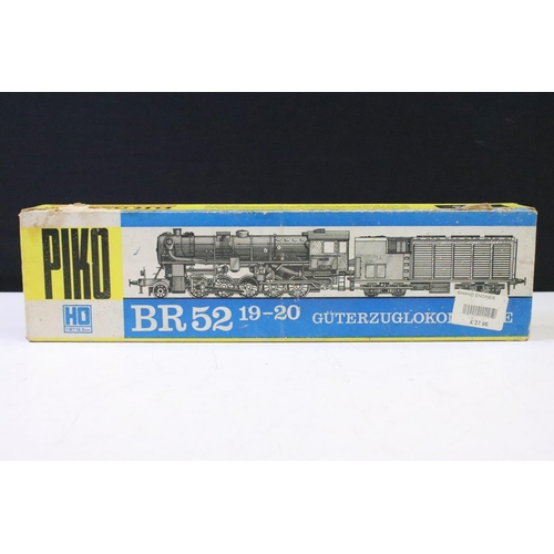 109 - Four Ho gauge locomotives to include a boxed Rivarossi 1224 Indiana Harbour Belt 102, boxed Piko BR5... 