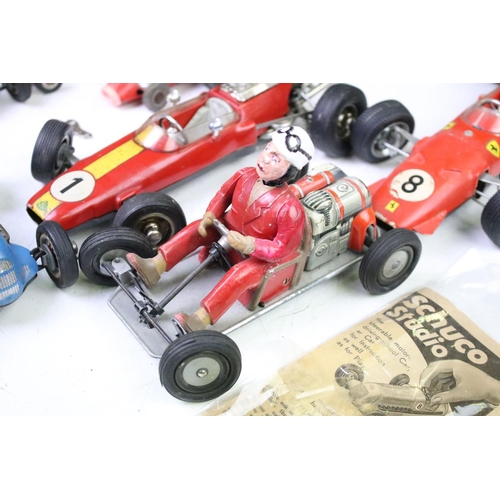 1271 - 11 Play worn Schuco clockwork models to include 1055 tinplate Go-Kart, 1071 Lotus Formula 1, 1072 BM... 