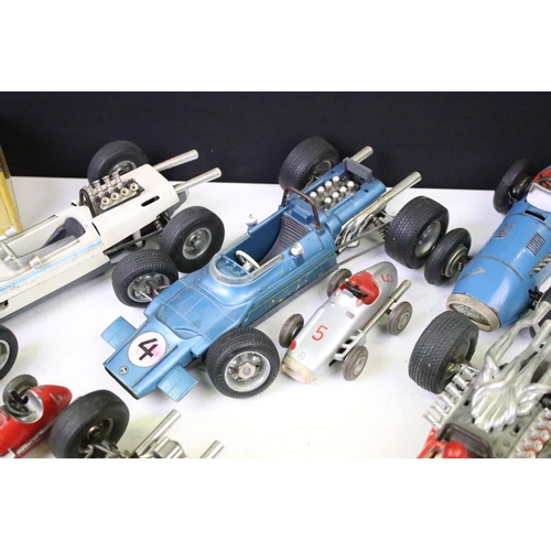 1271 - 11 Play worn Schuco clockwork models to include 1055 tinplate Go-Kart, 1071 Lotus Formula 1, 1072 BM... 