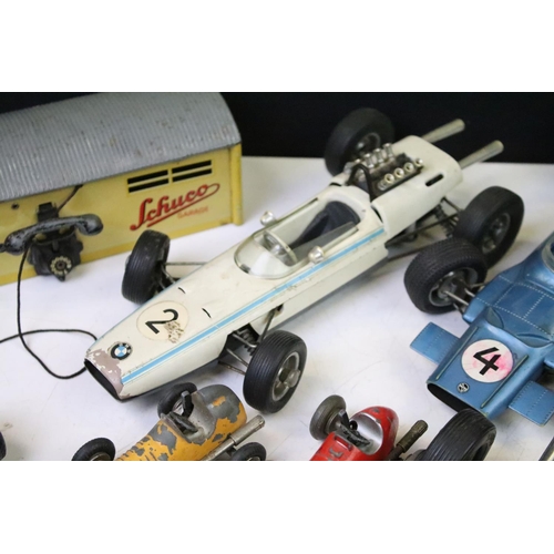 1271 - 11 Play worn Schuco clockwork models to include 1055 tinplate Go-Kart, 1071 Lotus Formula 1, 1072 BM... 