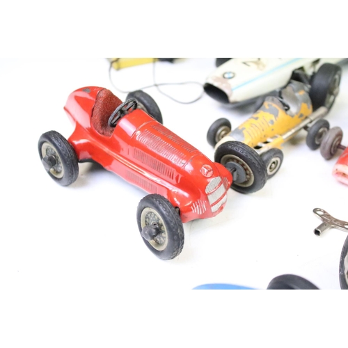 1271 - 11 Play worn Schuco clockwork models to include 1055 tinplate Go-Kart, 1071 Lotus Formula 1, 1072 BM... 