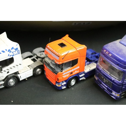 1214 - Large collection of unboxed diecast models to include mainly haulage models featuring trucks and tra... 