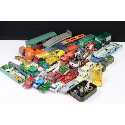 1274 - Around 35 mid 20th C play worn diecast models to include Dinky, Corgi and Matchbox, featuring Corgi ... 