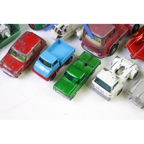 1274 - Around 35 mid 20th C play worn diecast models to include Dinky, Corgi and Matchbox, featuring Corgi ... 