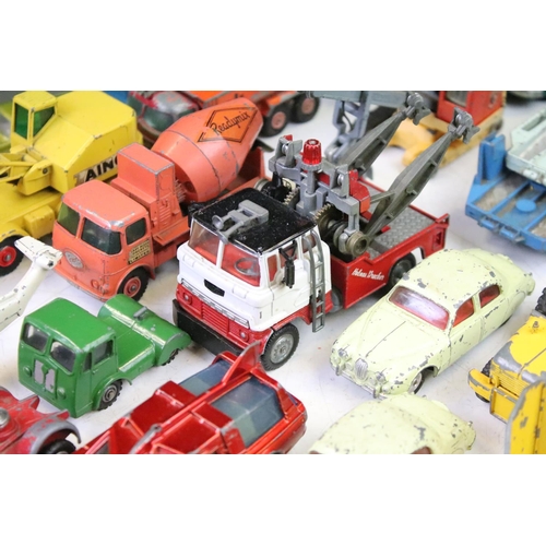 1274 - Around 35 mid 20th C play worn diecast models to include Dinky, Corgi and Matchbox, featuring Corgi ... 