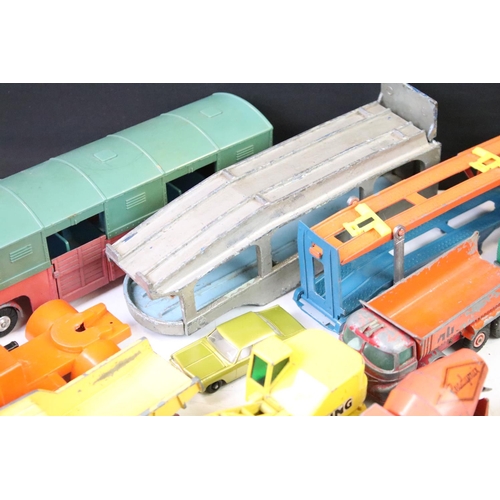 1274 - Around 35 mid 20th C play worn diecast models to include Dinky, Corgi and Matchbox, featuring Corgi ... 