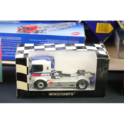 1217 - Collection of around 45 boxed / cased diecast models to include Minichamps, Britains 42765, Siku mod... 