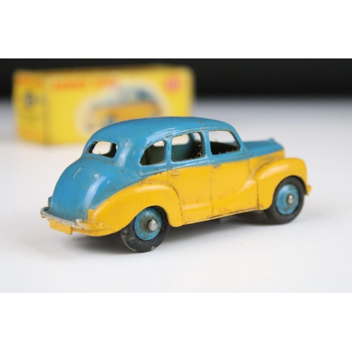 1367 - Boxed Dinky 152 Austin Devon Saloon diecast model in two tone blue and yellow, with blue hubs, dieca... 