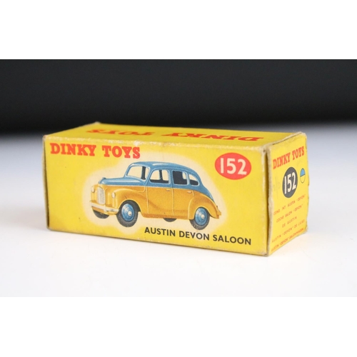 1367 - Boxed Dinky 152 Austin Devon Saloon diecast model in two tone blue and yellow, with blue hubs, dieca... 