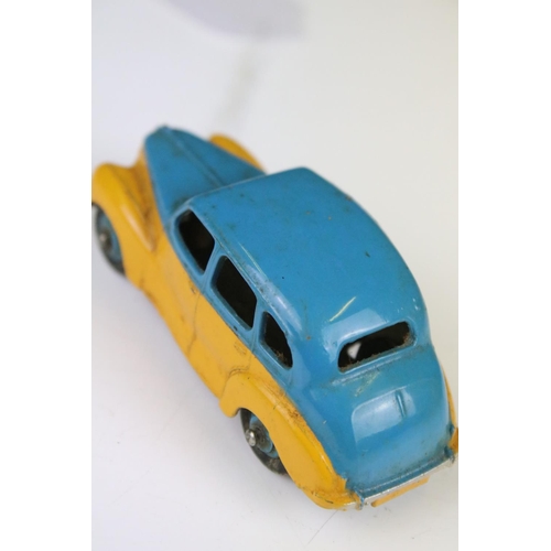 1367 - Boxed Dinky 152 Austin Devon Saloon diecast model in two tone blue and yellow, with blue hubs, dieca... 