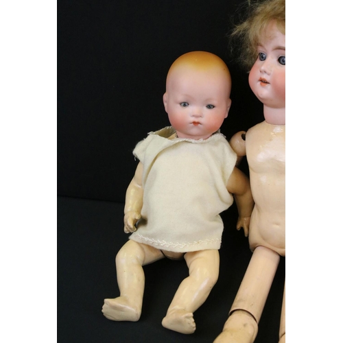 340 - Four early 20th C Armand Marseille bisque headed dolls with glass eyes & painted facial features, th... 