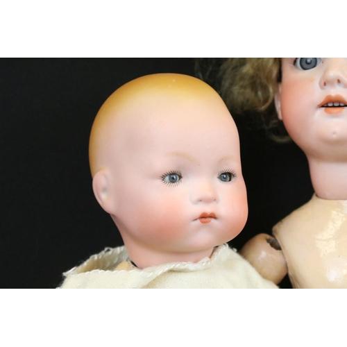 340 - Four early 20th C Armand Marseille bisque headed dolls with glass eyes & painted facial features, th... 