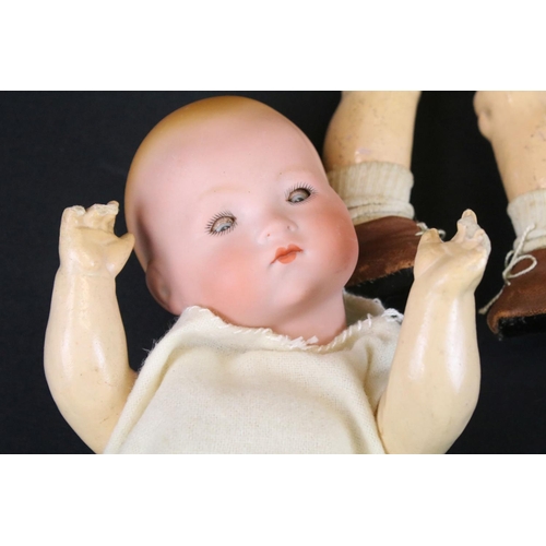 340 - Four early 20th C Armand Marseille bisque headed dolls with glass eyes & painted facial features, th... 