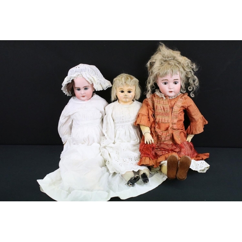 341 - Two early 20th C bisque headed dolls with glass sleeping eyes, open mouths, painted facial features ... 