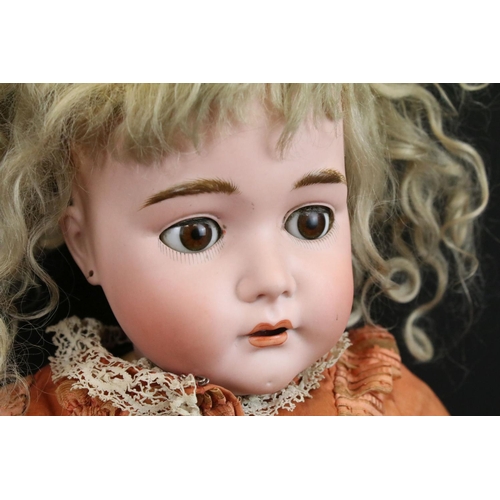 341 - Two early 20th C bisque headed dolls with glass sleeping eyes, open mouths, painted facial features ... 