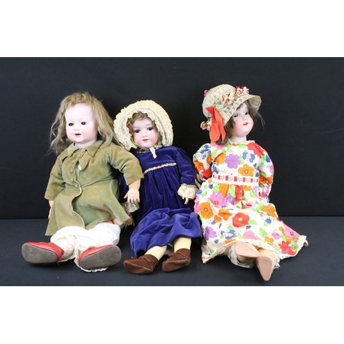 342 - Three early 20th C Armand Marseille bisque headed dolls with glass sleeping eyes, open mouths, paint... 