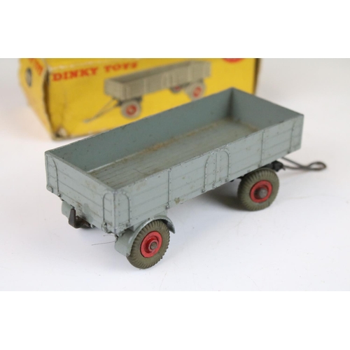 1371 - Four boxed Dinky 428 Trailer (large) diecast models all in grey with red hubs, showing play wear, bo... 