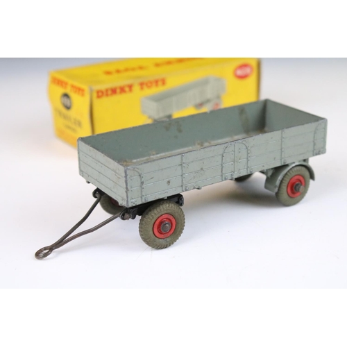 1371 - Four boxed Dinky 428 Trailer (large) diecast models all in grey with red hubs, showing play wear, bo... 